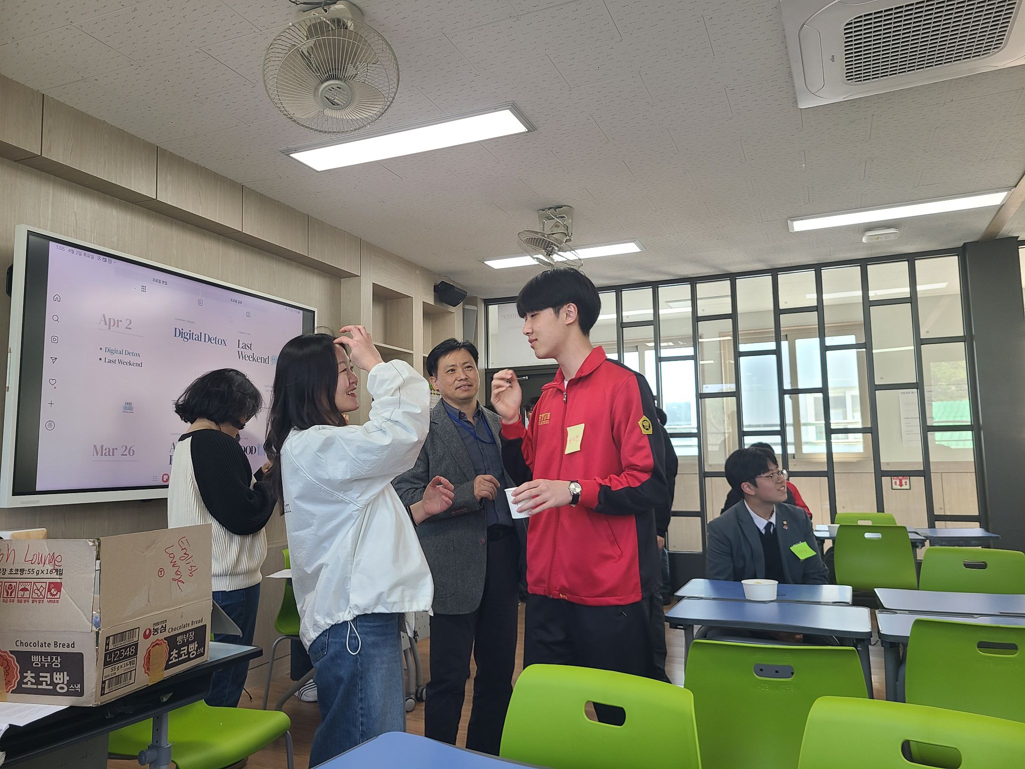 Teacher and student talking in English